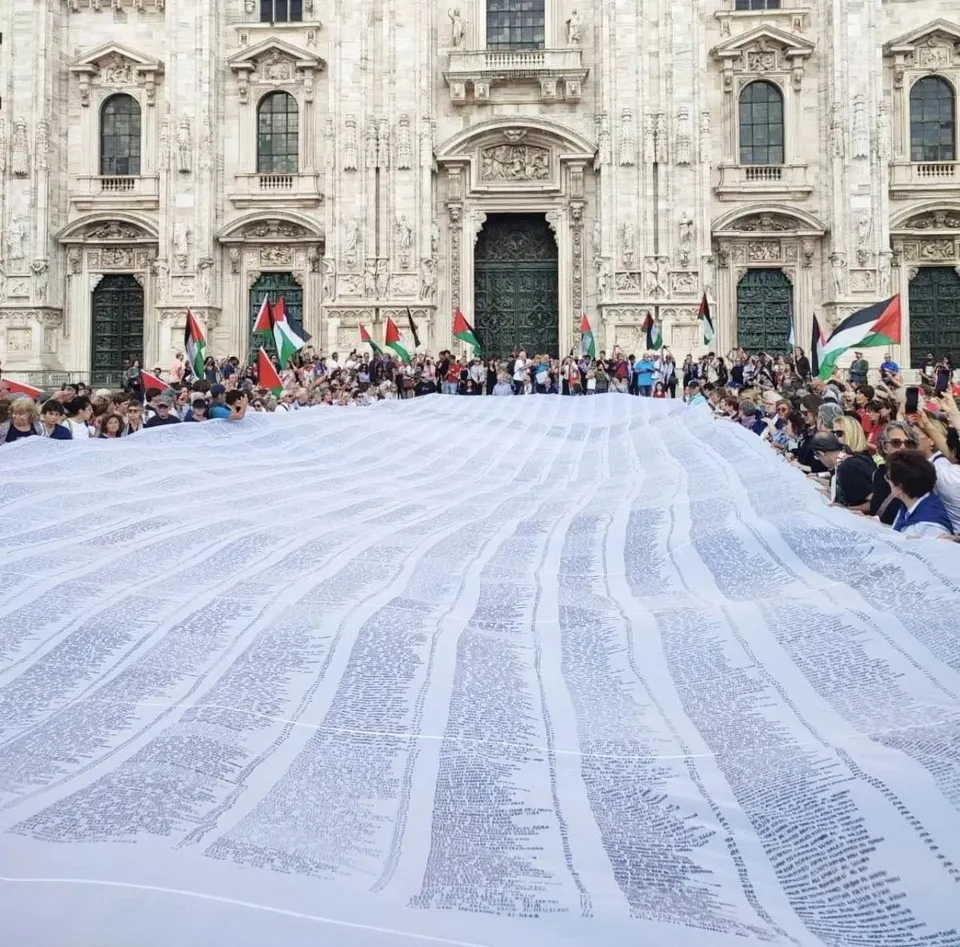 The shroud of names unfurled outside Milan Cathedral, the Italian memorial that inspired the exhibition now touring the US