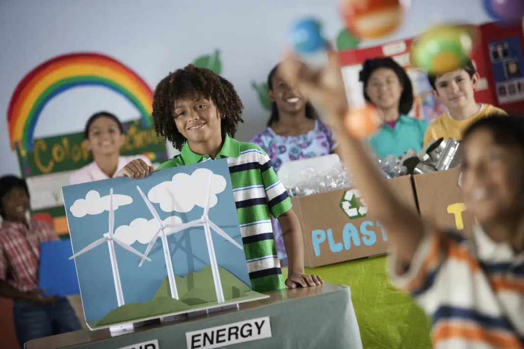 BESA Organizes The 9th International Educational Fair in Egypt A class of children at a Green Science Fair event, with presentations on solar power and recycling.