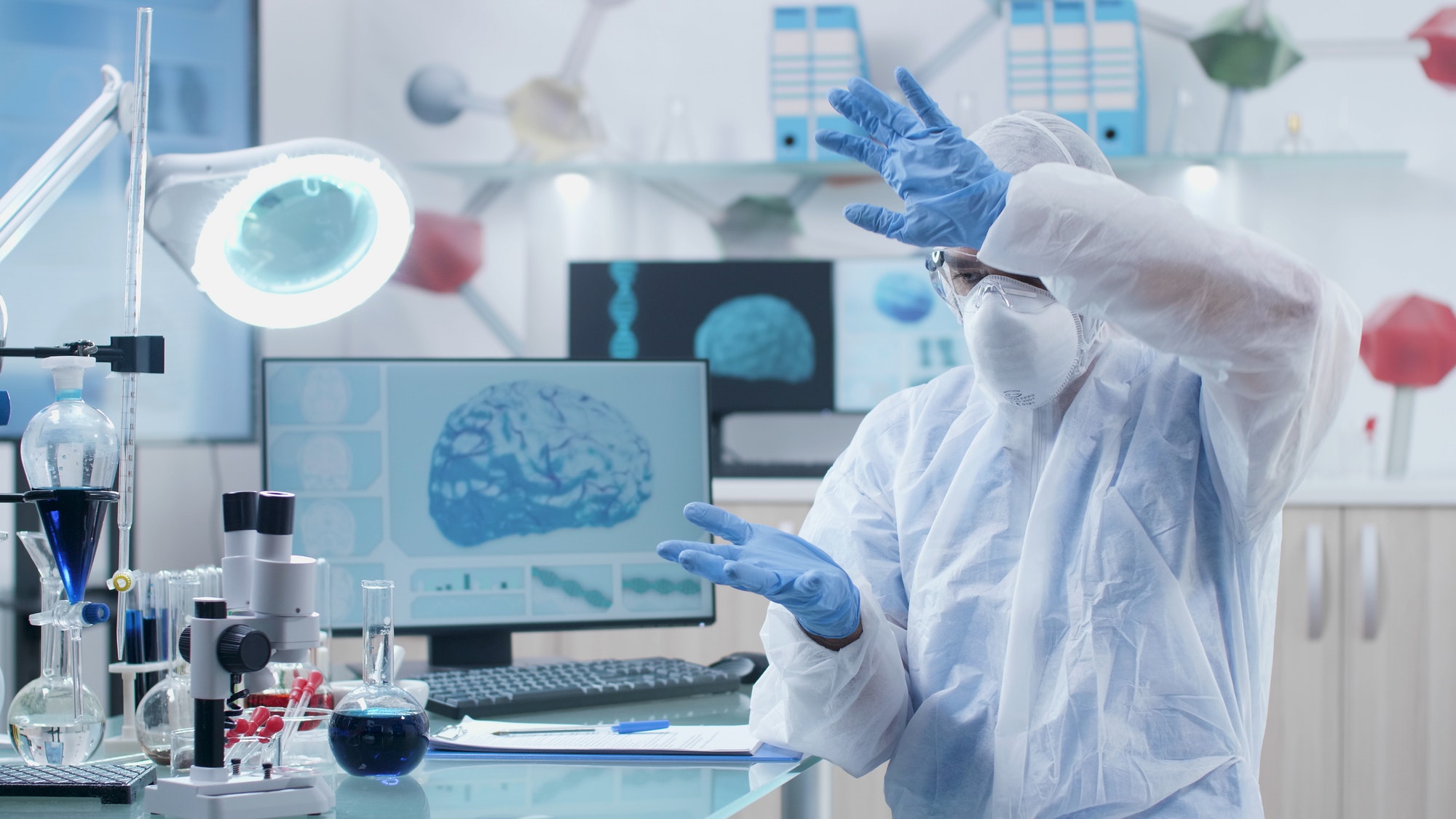 Neurologist scientist researcher analyzing brain activity during neuroscience experiment