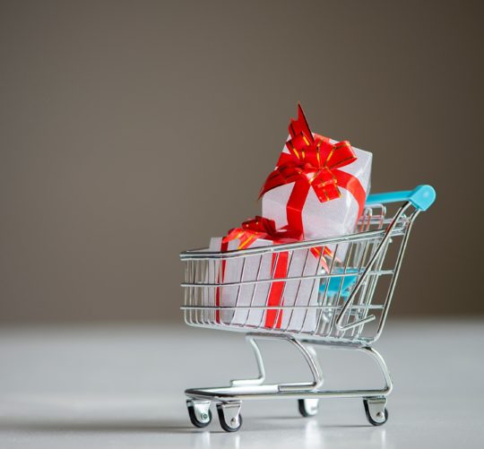 White colors gift or presents boxes in a shopping cart, for sales promotion and rewards concept