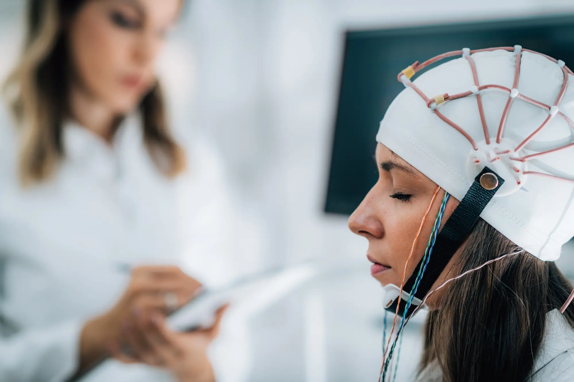 Doctor and Patient in Neuroscience Lab, Doing EEG Scan