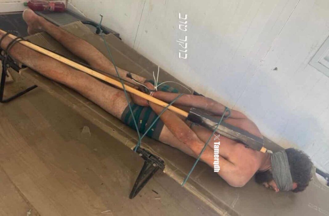 Outcry Grows as Photo of Bound Gaza Detainee Reignites Torture and War Crimes Allegations Against Israel Outcry Grows as Photo of Bound Gaza Detainee Reignites Torture and War Crimes Allegations Against Israel